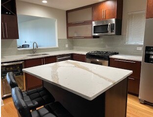 remodeled kitchen with island - 1 Mansfield Grove Rd
