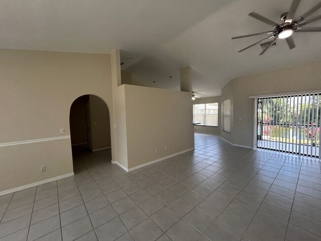 Building Photo - Freshly painted interior 2/2  spacious home on fresh water canal