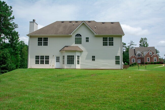 Building Photo - Executive Home with 5 Bedrooms and 3 Full ...