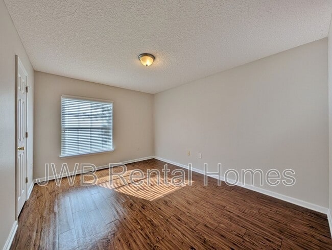 Building Photo - 8402 McGirts Village Ln