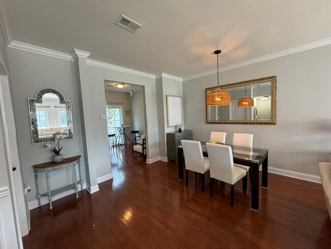 Main level has gleaming hardwood floors. - 301 Villa Dr