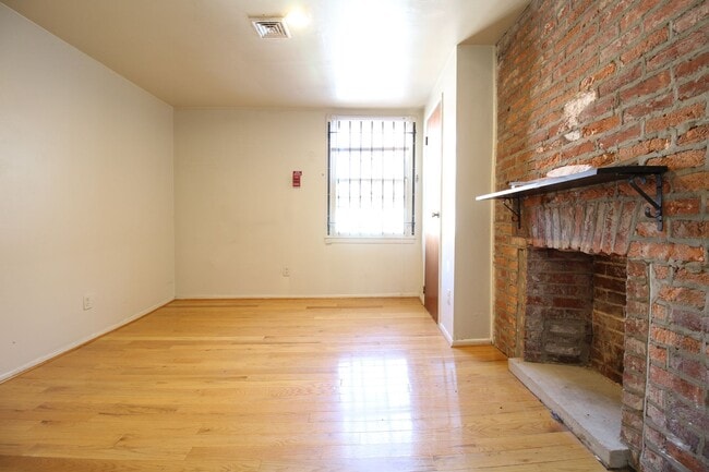Building Photo - Spacious 2 BR 2 BA w/ Decorative Fireplace...