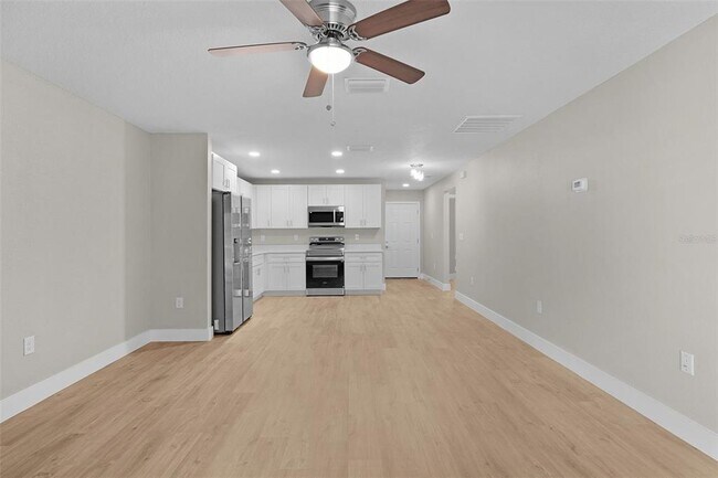 Building Photo - 9170 N Travis Dr