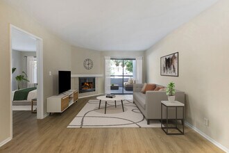 Renovated Package II living room with hard surface flooring - Avalon Burbank