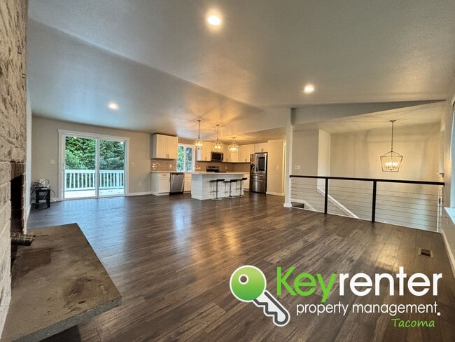 Building Photo - Split level 3 Bed 2 Bath Upstairs Unit with Modern Upgrades Close to JBLM!