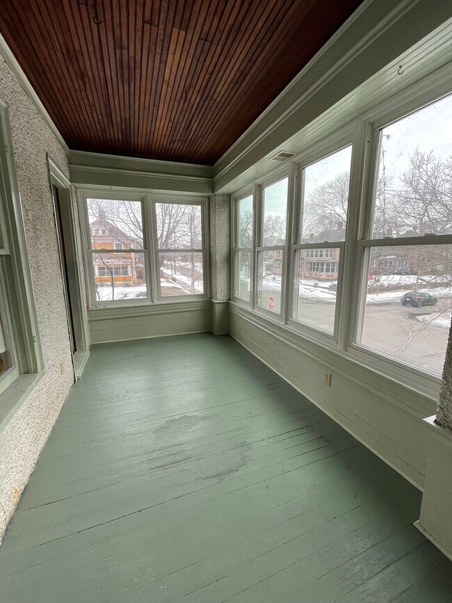 Large four season porch. - 1200 W 32nd St