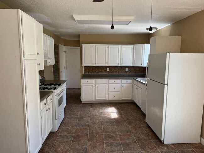 Building Photo - Spacious Home Coming Soon