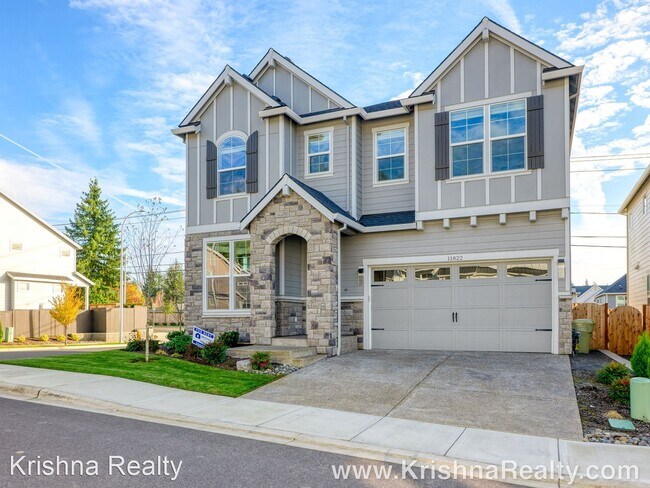 Building Photo - 4 br, 3 bath House - 11822 NW Thelin Ln