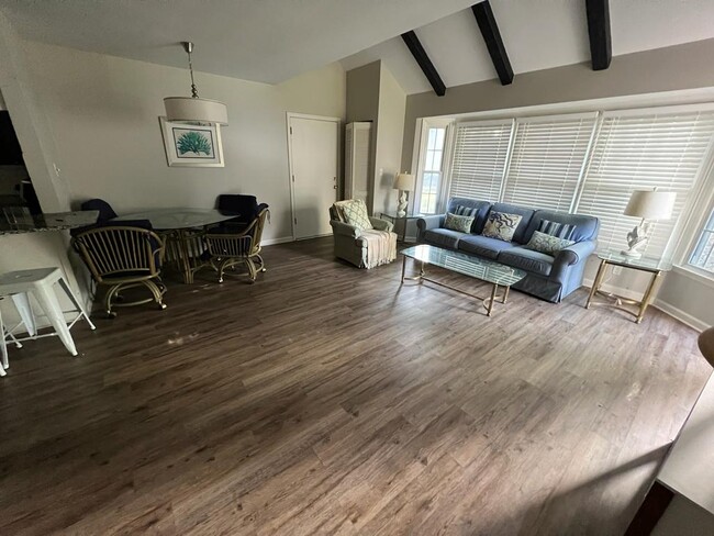 Living Room With Dinner Table - 1204 Benna Dr