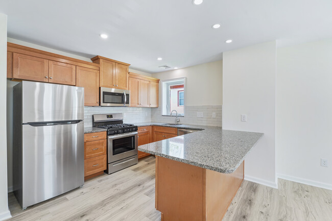 New granite countertops and stainless appliances - 412 S Walnut St