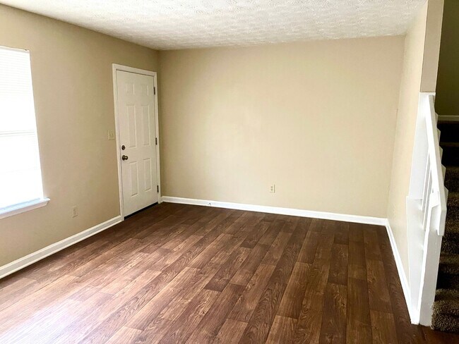 Building Photo - Welcome to COZY Townhome in Fayetteville, ...