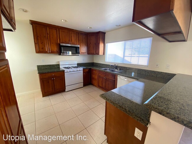Building Photo - 4 br, 3 bath House - 2135 E. Nugent St.