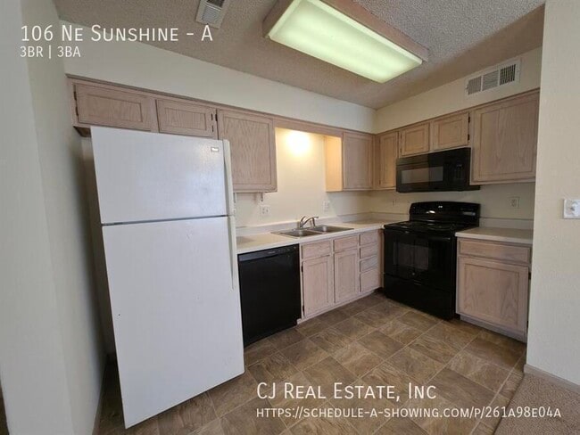 Building Photo - 106 Ne Sunshine-A