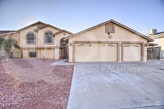 Building Photo - 8821 W Cavalier Dr