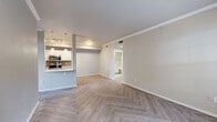 Located in Grapevine, TX, this 2-bedroom, 2-bathroom residence offers a thoughtfully designed single-floor layout. Throughout the home, light-toned herringbone-patterned flooring creates a cohesive and stylish aesthetic. The living room features crown molding, a recessed light, and a large window that fills the space with natural light and outdoor views, complemented by a welcoming front entry door. The kitchen is well-appointed with white shaker cabinetry, quartz-style countertops, a gray subway tile backsplash, and a full suite of stainless steel appliances including a refrigerator, electric range, microwave, and dishwasher. Track lighting and an open sightline to the living area enhance the kitchen's functional appeal. Both bedrooms are generously sized, each equipped with a ceiling fan and windows offering natural light and outdoor views. The primary bedroom provides a comfortable retreat with its own dedicated closet. Each bathroom features white vanity cabinetry with quartz countertops, a tub/shower combination, and herringbone-patterned tile flooring. Additional conveniences include a dedicated laundry area, hallway, and two closets, rounding out this well-organized and move-in-ready home.
