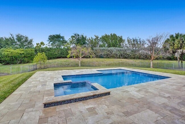 Foto del edificio - Great Pool Home with excellent lake View in Heron Bay, Parkland