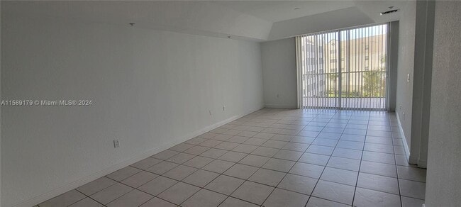 Building Photo - 10710 Northwest 66th Street Apt #409, Dora...