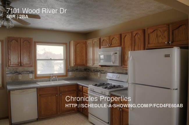 Building Photo - 7101 Wood River Dr