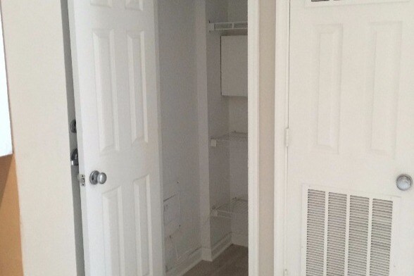 Coat Closet with Extra Storage Shelves - 2001 12th St NW