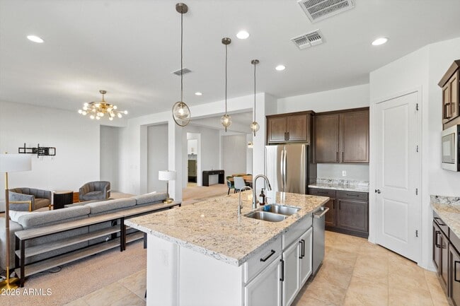 Building Photo - 10812 E Tesla Ave