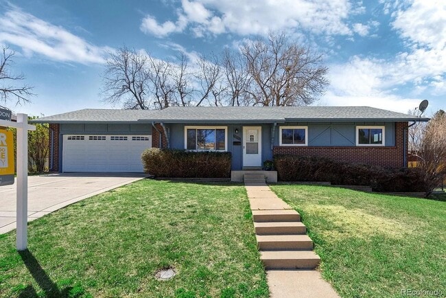 Ranch level home with attached 2 car garage and driveway for off street parking.! - 7896 E Jefferson Pl