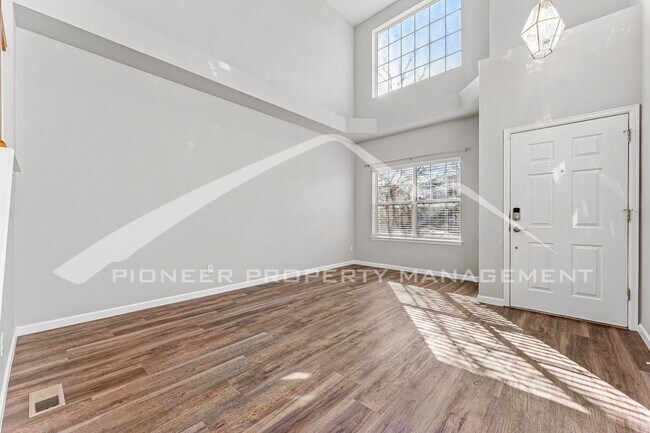 Building Photo - Spacious Home with Fenced Yard, AC, and 2 ...