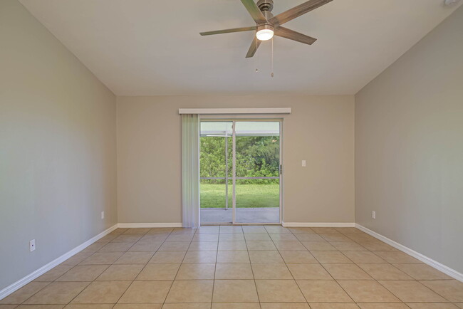 Living Room with Screened in Lanai off the back - 704 Ichabod Ave S