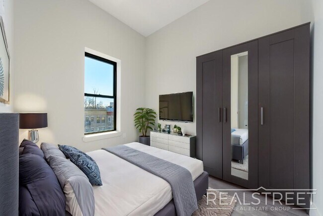 Foto del edificio - New Modern 2 Bed w Full Amenities + Dishwa...