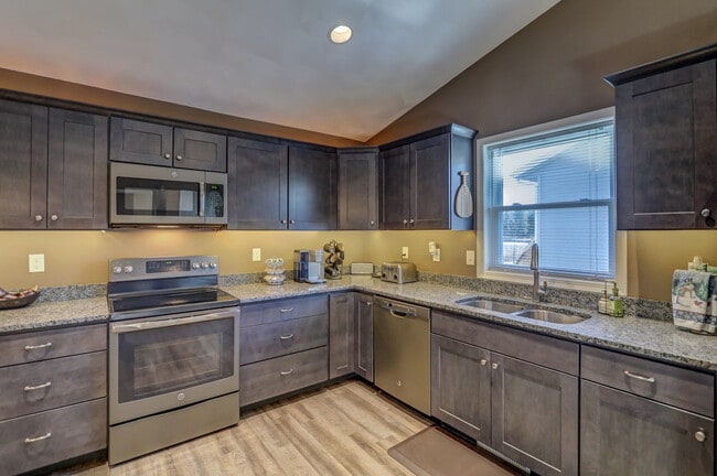 Kitchen with range and above microwave hood - 846 Thompson Drive