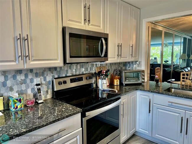 Building Photo - 9787 N Belfort Cir
