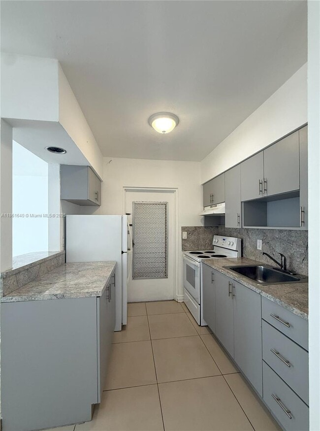 Building Photo - 4410 W Flagler St