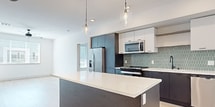 Step into a world of contemporary luxury where every detail has been carefully curated for your ultimate satisfaction. The heart of this home is a chef's dream kitchen, boasting sleek cabinetry, high-end appliances, and a stylish island perfect for entertaining. Bask in the abundance of natural light that floods the open-concept living area, creating an airy and inviting atmosphere. The primary bedroom, a spacious 130 sq ft retreat, features a barn door leading to a walk-in closet, embodying both charm and functionality. Indulge in the spa-like bathrooms, where modern fixtures meet elegant finishes. With its prime Sacramento location, this home isn't just a place to live—it's a lifestyle upgrade waiting to be claimed.