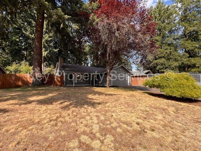 Building Photo - Orchards Ranch with Large Fenced Yard - Re...