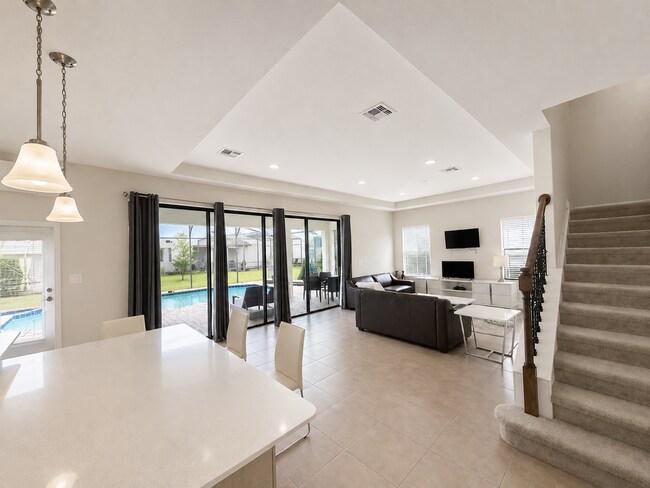 Building Photo - Expansive 6-Bed, 6.5-Bath on Angela's Avenue – Your Perfect Haines City Haven!