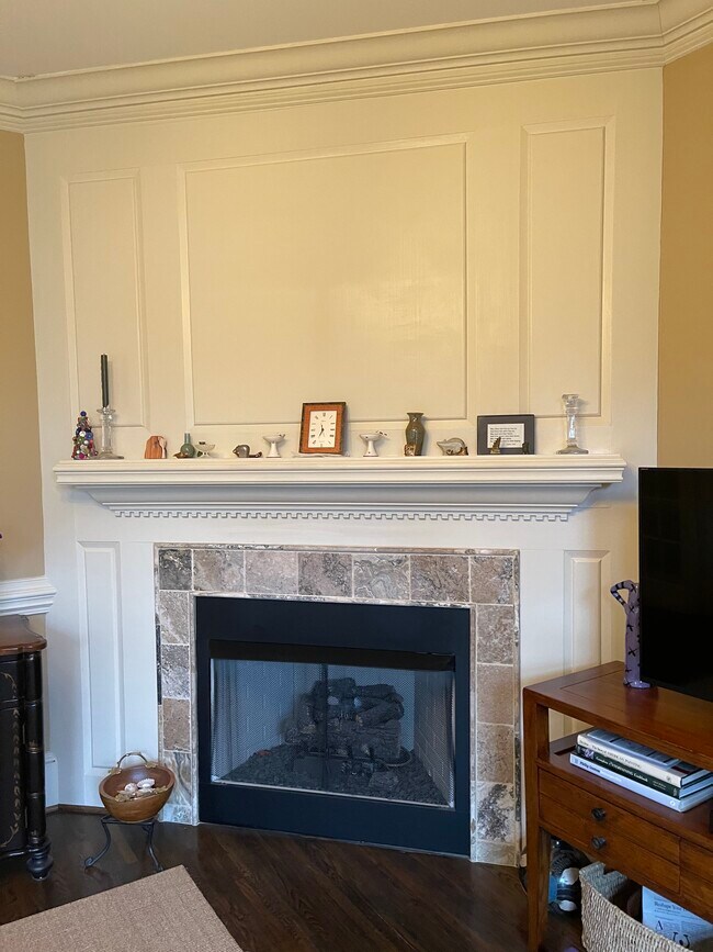 gas fireplace with detail molding - 418 Clement Ave