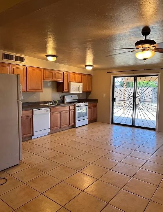 Building Photo - 6027 S Lostan Ave