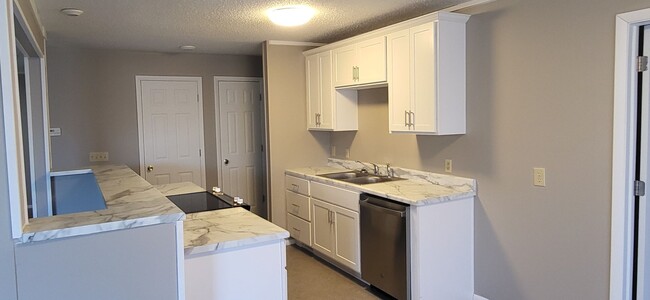 Building Photo - 4 Bedrooms! 2 Bathrooms! Updated! $1295!