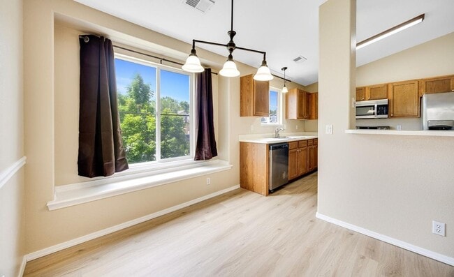 Building Photo - 3 Bed Top Floor Condo near Ft. Carson with detached Garage