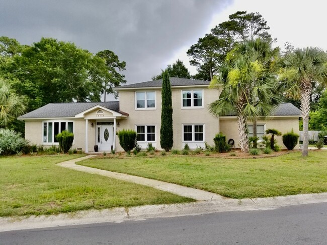 Building Photo - Charming 4 Bedroom Home with Saltwater Poo...