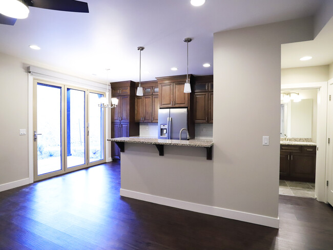 Livingroom with kitchen view - 102 Trapper Cir