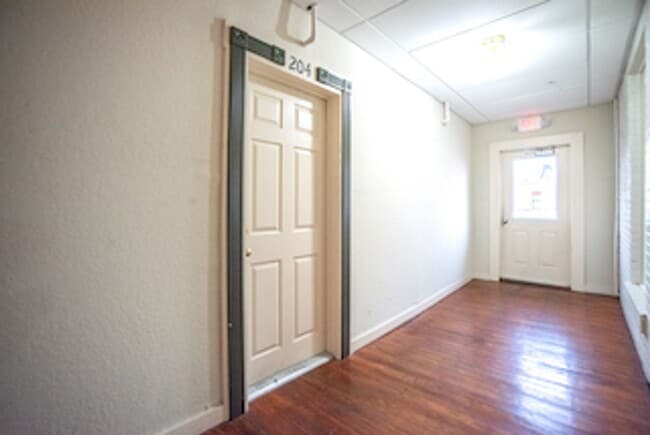 Building Photo - Corner Unit Available! unit 204