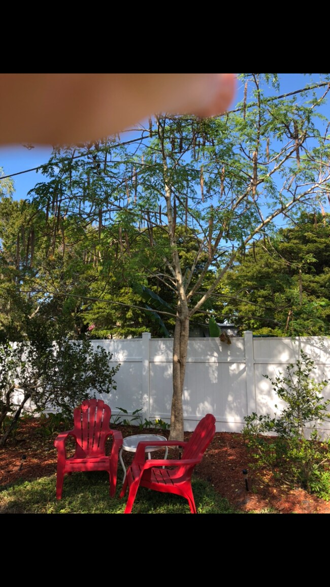 The private yard offers seating for reading or just relaxing. - 5703 Murdock Ave