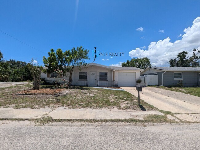Foto del edificio - Must See 3/2/1 over 1000sf with tile/lamin...
