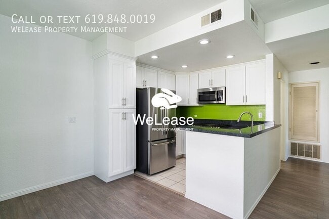 Building Photo - Stylish 2-Bed 2-bath Townhome in Desirable...