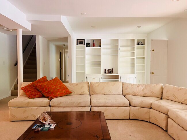 Wall shelf & L shaped sofa living room - 9806 Kentsdale Dr