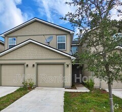 Building Photo - 7863 Playschool Ln