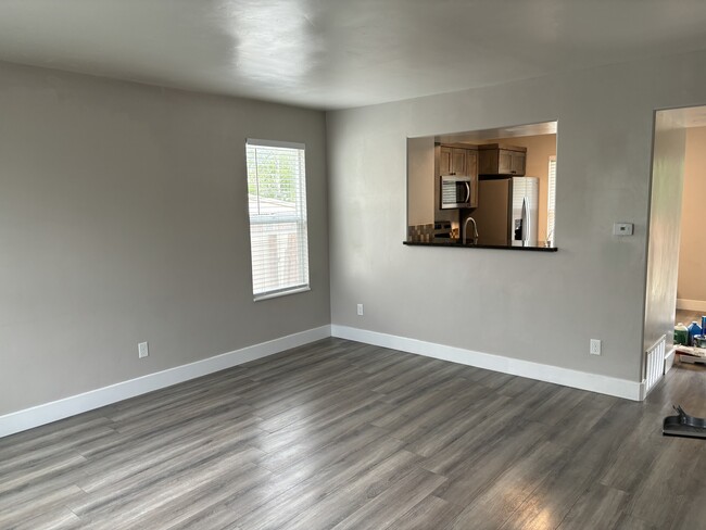 Living Room looking towards Kitchen - 363 Royal Troon Dr