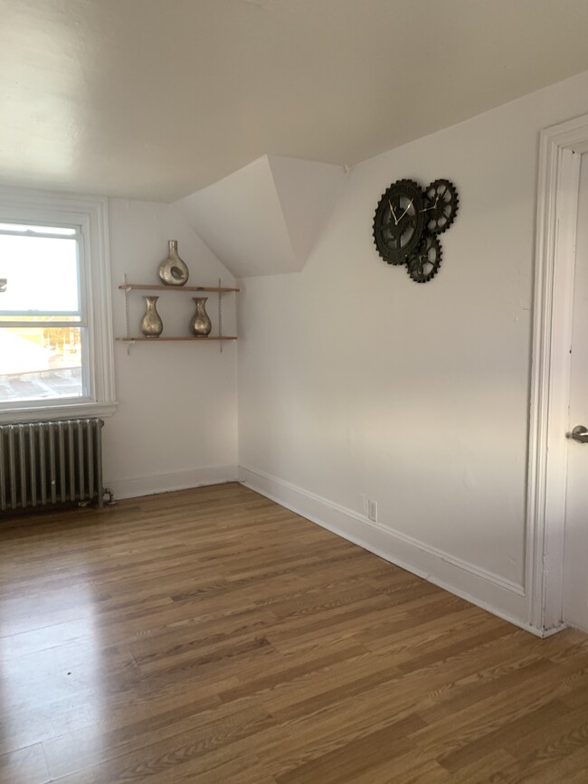 An additional space (office, prayer space, yoga space) in between 3rd floor bathroom and bedroom! - 955 Springfield Rd