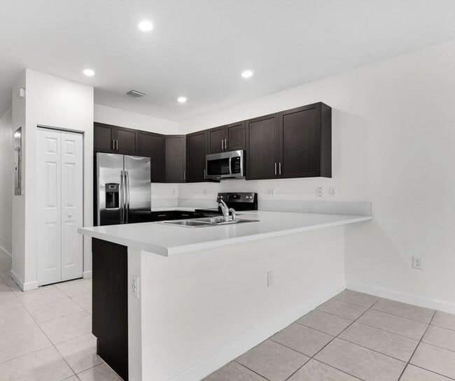 Building Photo - 10606 West 33rd Ct