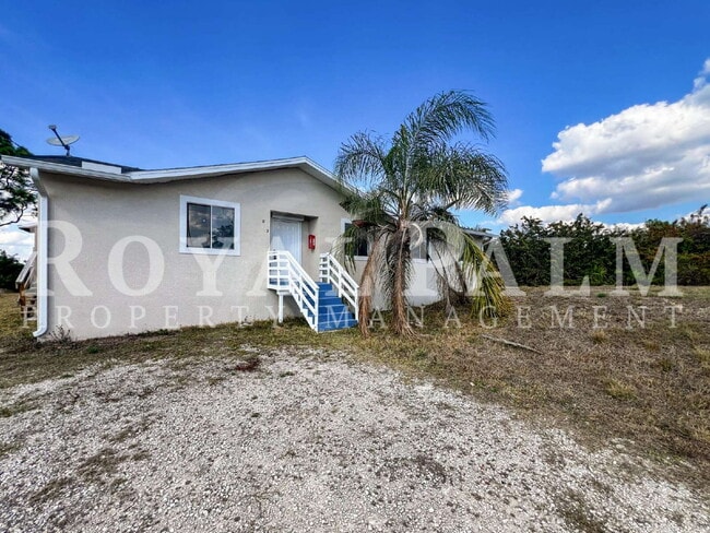 Building Photo - 4 Bedrooms, 2 Bathrooms & a Huge Backyard — Spacious Lehigh Acres Home with Pet-Friendly Living o...